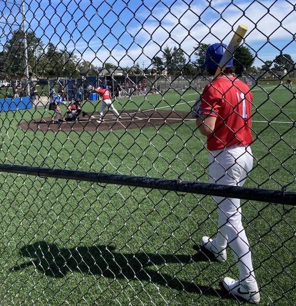 Horn homers and saves Cats opener